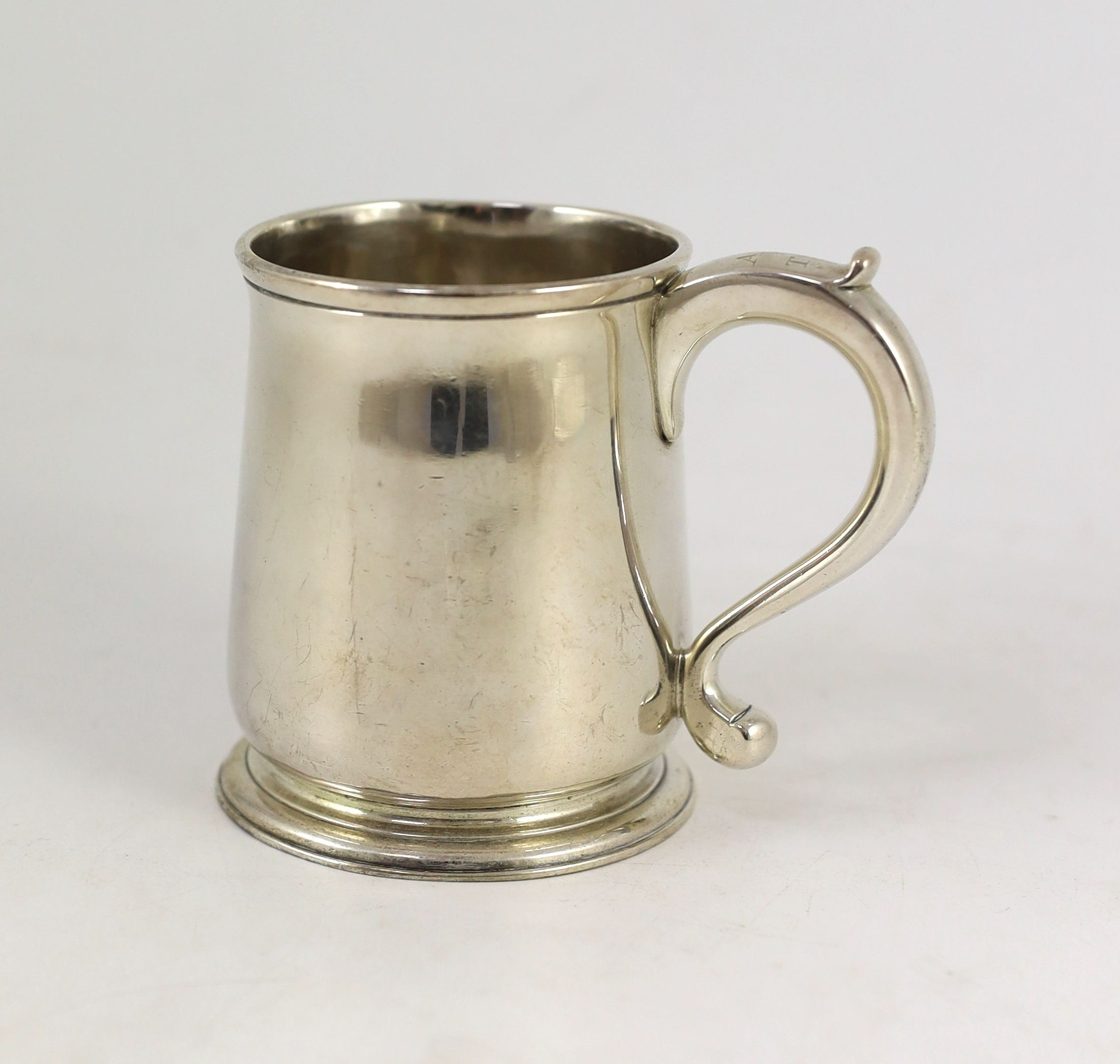 An early George II silver mug, London by Robert Lucas